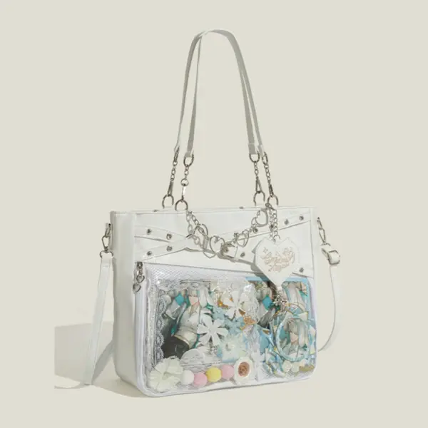 White tote ita bag with clear window displayed as an everyday accessory