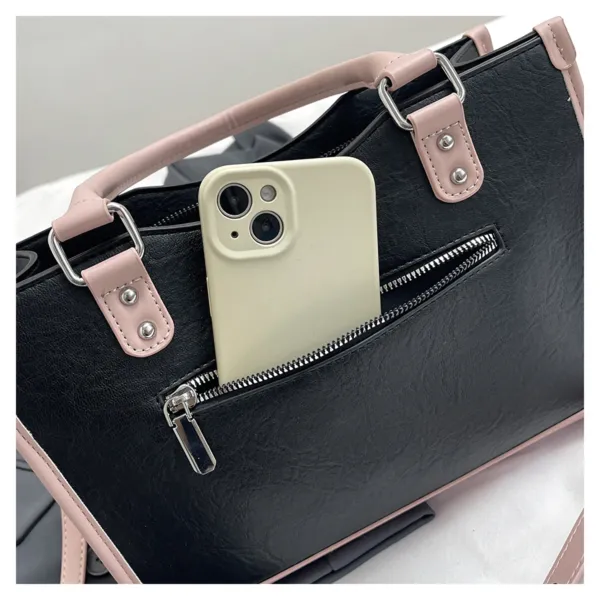 Ita bag flat lay with accessories and plush