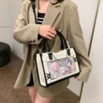 White Ita Bag Crossbody Worn by Model – Casual Style