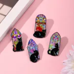 Black Cat Enamel Pins on Pink Surface Black Cat Enamel Pins on Pink Surface