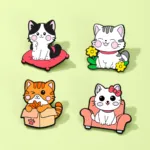 Cat Enamel Pins on Light Green Background
