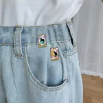 Cat Tarot Enamel Pins on Denim Jeans Cat Tarot Enamel Pins on Denim Jeans