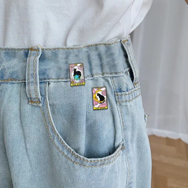 Cat Tarot Enamel Pins on Denim Jeans Cat Tarot Enamel Pins on Denim Jeans