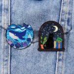 Enamel pins on blue denim fabric