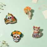 Enamel Pin Set Displayed on Green Surface Enamel Pin Set Displayed on Green Surface