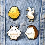 Animal Enamel Pins Attached to Denim Pocket