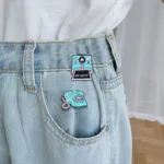 Enamel Pins on Denim Jeans Enamel Pins on Denim Jeans