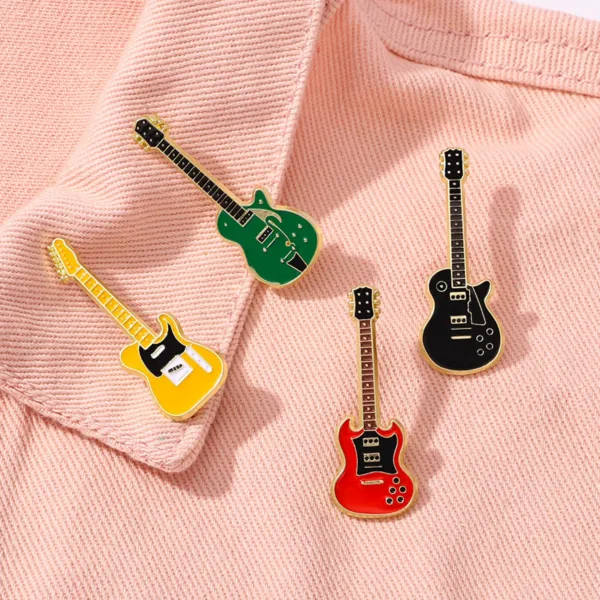 Guitar Enamel Pins on Light Fabric Guitar Enamel Pins on Light Fabric