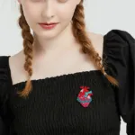 Anatomical Heart Enamel Pin Worn on Clothing