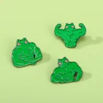 Muscle Frog Pins on Light Green Background