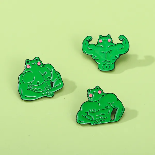 Muscle Frog Pins on Light Green Background
