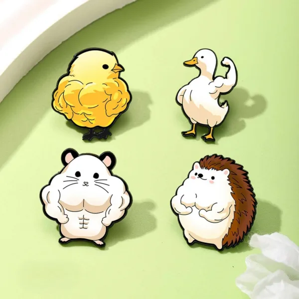 Muscular Animal Enamel Pins on Green Surface