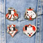 Playing Card Enamel Pins on Denim Playing Card Enamel Pins on Denim