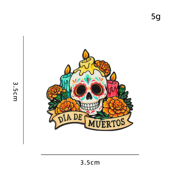 Close-up of a sugar skull pin with candle design on white background