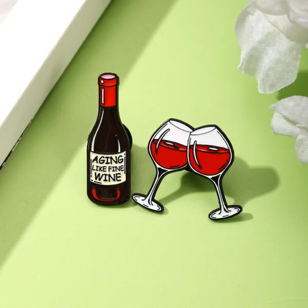 Wine Enamel Pins on Green Surface Wine Enamel Pins on Green Surface