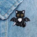 Bat Cat Enamel Pin on Denim Bat Cat Enamel Pin on Denim
