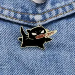 Black Cat Crime Enamel Pin on Denim Jacket Black Cat Crime Enamel Pin on Denim Jacket