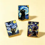 Black Cat Enamel Pins on Beige Surface