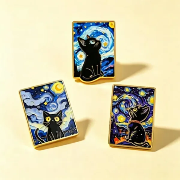 Black Cat Enamel Pins on Beige Surface