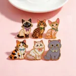 Cat Enamel Pin Set on Pink Background
